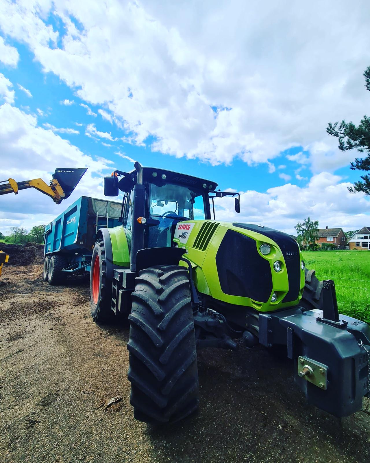 Professional tractor work operation showing Forestwood Services equipment in action
